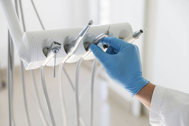 Professional Emergency Dentist technician working in Alpine, NJ